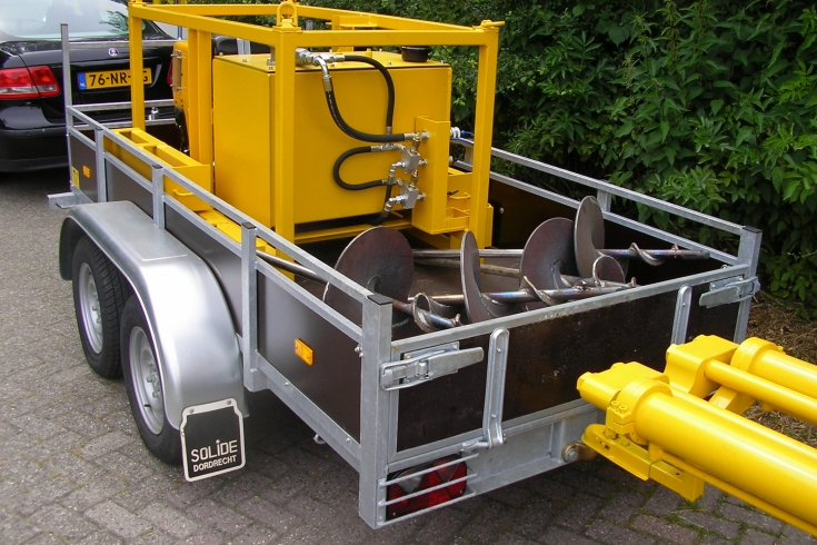 Trailer with diesel-hydraulic power-pack and anchors
