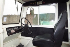 Operator cabin of a TUG aircraft tow tractor